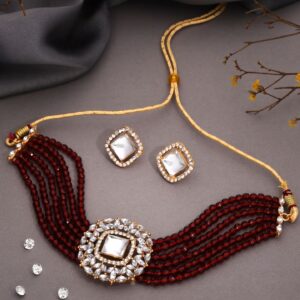 Glamorous gold choker ensemble showcasing beads
